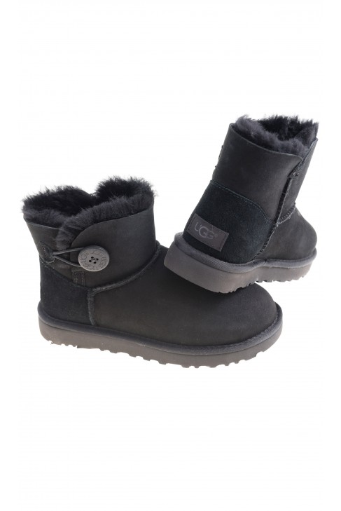 Black low boots fastened with a button on the side, UGG