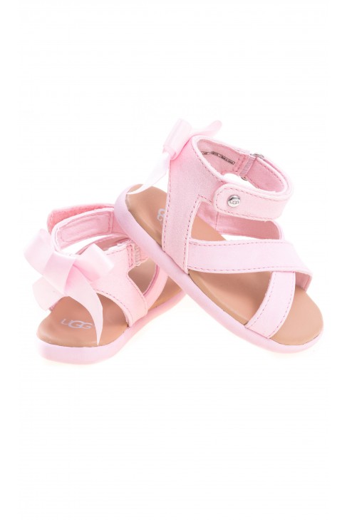 Pink baby sandals fastened around the ankle, UGG